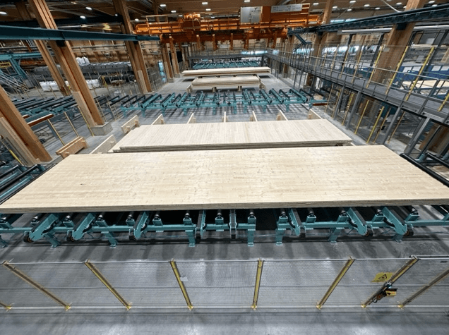 Inside the new Södra CLT Facility in Väröbacka where mother boards are being prepared for the CNC machine. 14 people operate on two shifts to produce two mother or master panels an hour, with two shifts a day producing 30 panels a day. (Photo credit: Clarissa Brandt)