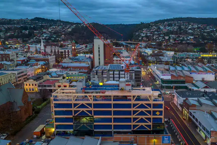 St Lukes Health's new Launceston headquarters is taking shape. After 'topping out' last month, it was recently featured by ABC News in a story looking at the adoption of mass timber in mid-rise and high-rise construction. (Supplied: Fairbrother)
