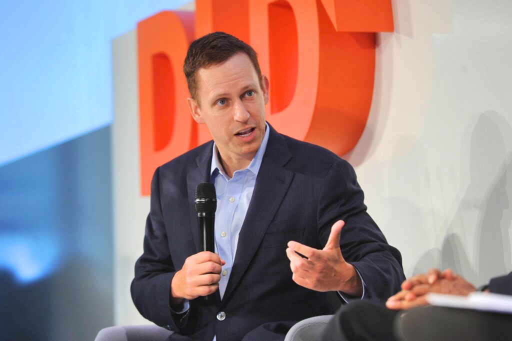 Peter Thiel, the former CEO of Pay Pal is at the forefront of AI and has pledged to use technology to remove all landmines from the world's most mined country. (Photo Credit: Credit: picture alliance / Tobias Hase shared on Flickr under Creative Commons)