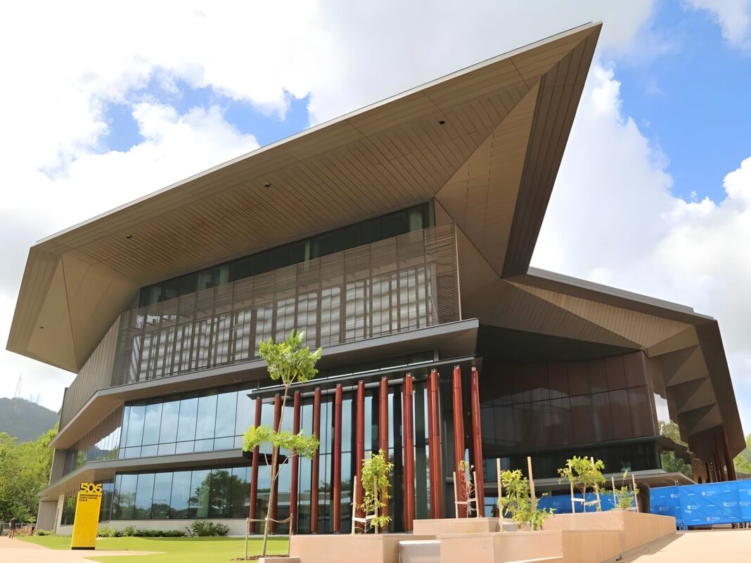 Locally manufactured glulam timber is used to form JCU’s Engineering and Innovation Place (EIP) facade system, which not only provides complete cyclone debris impact resistance but achieves both abundant day lighting and transparency and thermal performance standards well beyond standard market systems – a world first for the tropics. The EIP’s atrium can also be naturally ventilated, use tempered air or a blend, acting as an intermediate cooling zone from the exterior to the interior. (Photo Credit: Supplied)