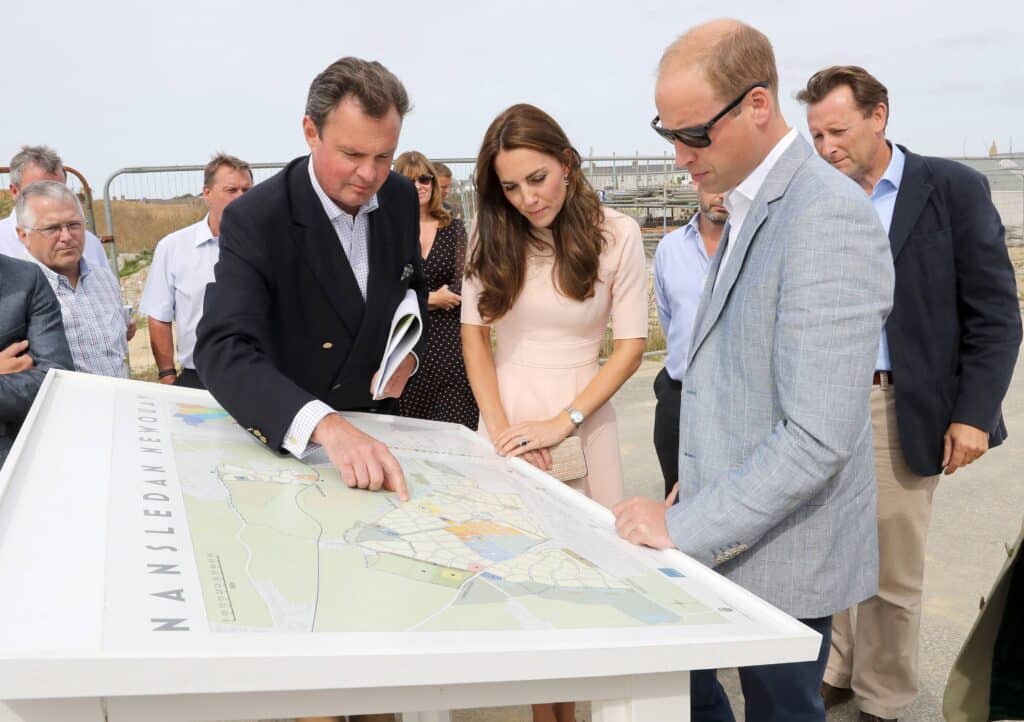 The Duke and Duchess of Cambridge are shown plans as they visit Nansledan, a 218-hectare site that will provide future business and housing for the local area in Newquay as part of their day-long tour of Cornwall. (Photo Credit: PA Images / Alamy Stock Images)