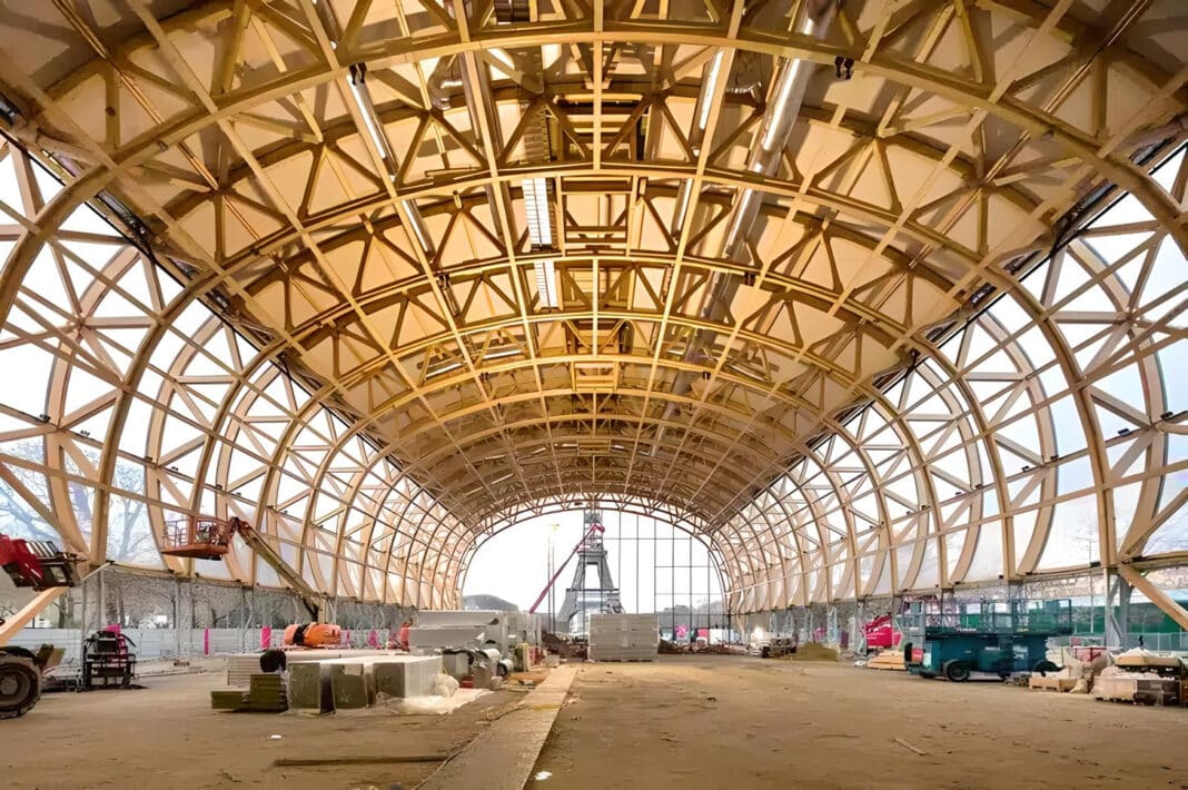 Work on the glue-laminated timber superstructure took just three months to assemble, with prefabricated beams and panels assembled into place by construction crews. (Photo Credit: Patrick Tourneboeuf)