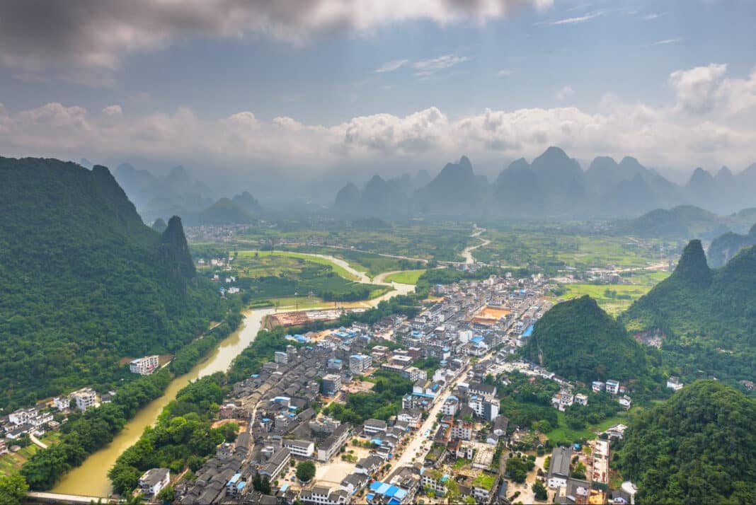 The Li River in rural Guilin, Guangxi, China is one of the world's great afforestation success stories. China is now hoping to create engineered wood products and pulp products from the world's largest eucalypt plantation and export it across global markets. (Photo Credit: SeanPavone via Envato Elements)