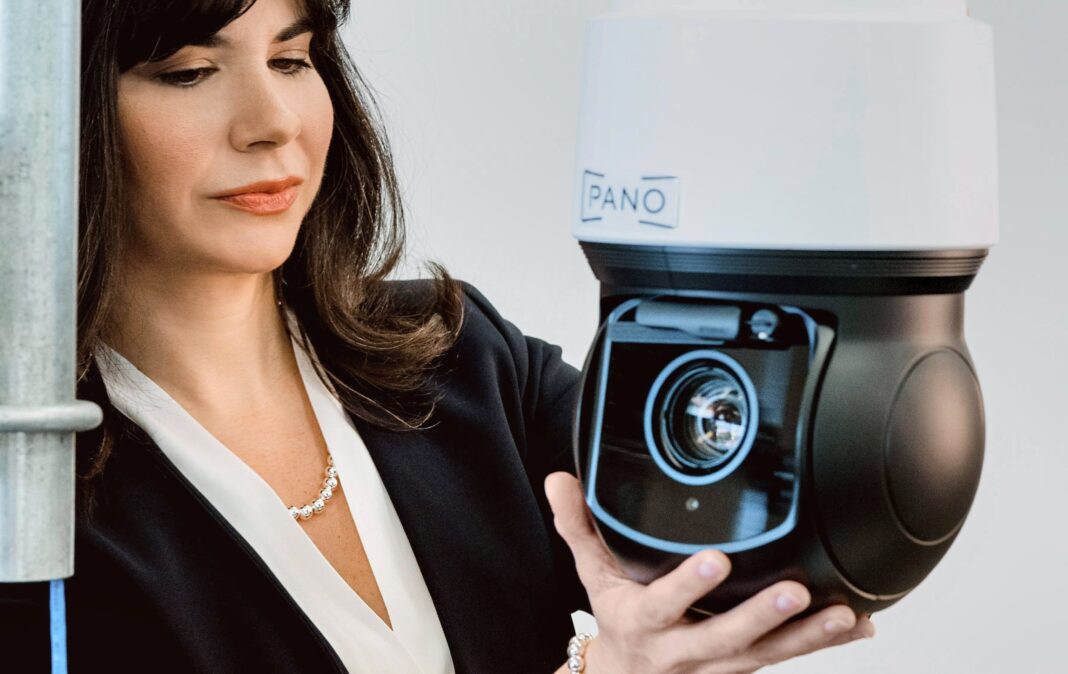 Pano AI CEO Sonia Kastner holds one of the Pano Station Cameras. (Photo Credit: Supplied by Pano AI)