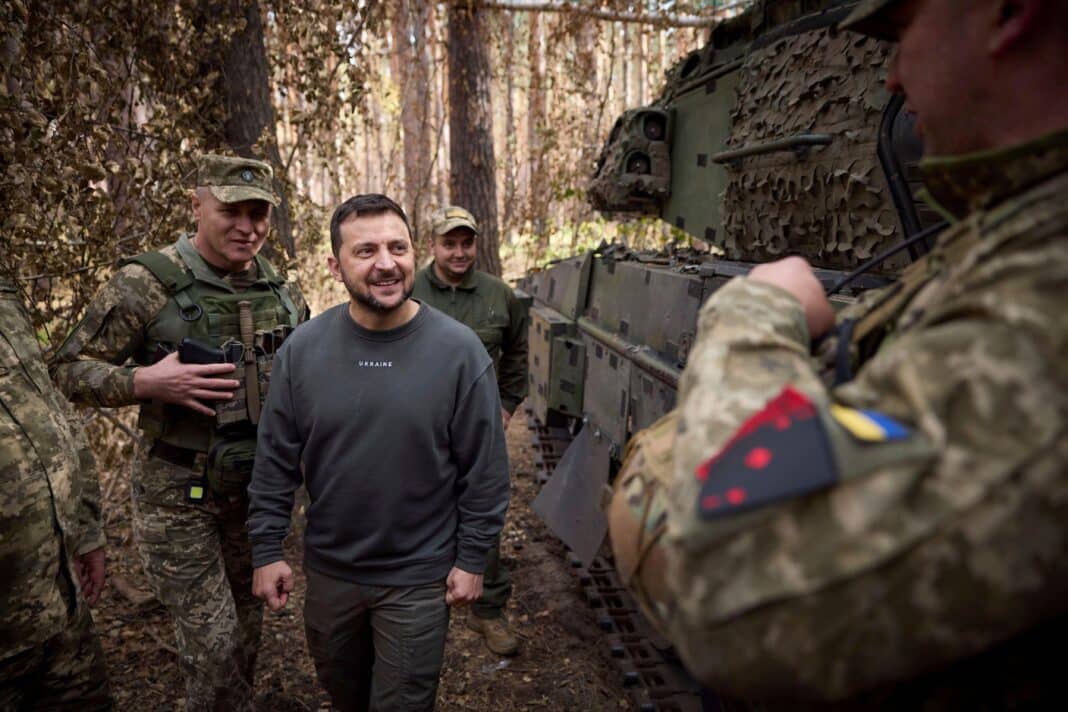 Ukrainian President Volodymyr Zelenskyy, centre, views a German-made Leopard 2 tank with the 21st separate mechanised brigade during a visit an October 2023 visit to the frontlines in the Kharkiv region. The forests of Kharkiv are set to become the new battleground as Russia's all-out assault on Ukraine escalates. (Photo Credit: Ukraine Presidency/Ukrainian Presidential Press Office/Alamy Live News)