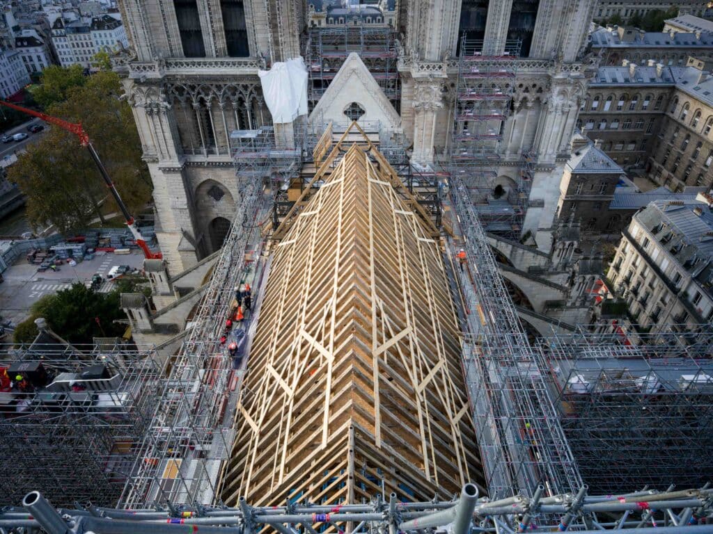 The cathedral roof, otherwise known as la forêt, or the forest, under construction. 35 PEFC-certified sawmills across France sourced French Oak from 175 PEFC-certified forests for the major restoration.(Photo Credit: Supplied by PEFC, copyright from Patrick Zachmann)