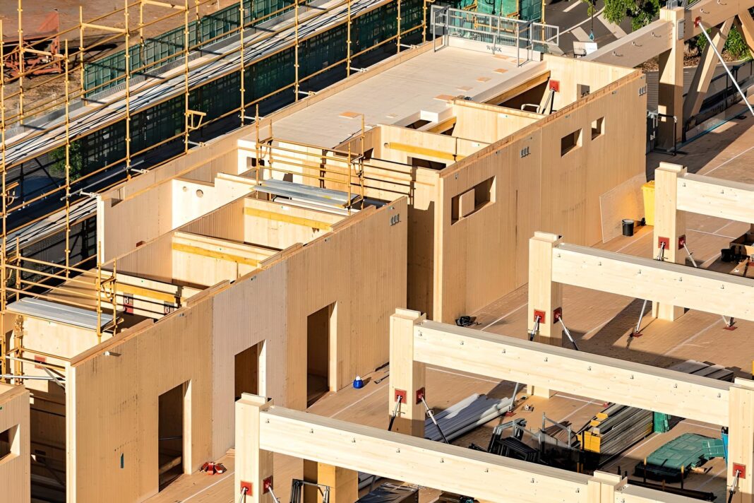 Lendlease was involved in developing the fully reversable post and plate connectors and has been involved in several of the world's most prominent mass timber projects including 25 King Street in Brisbane, which was for a time the world's tallest mass timber building. (Photo Credit: Lend Lease)
