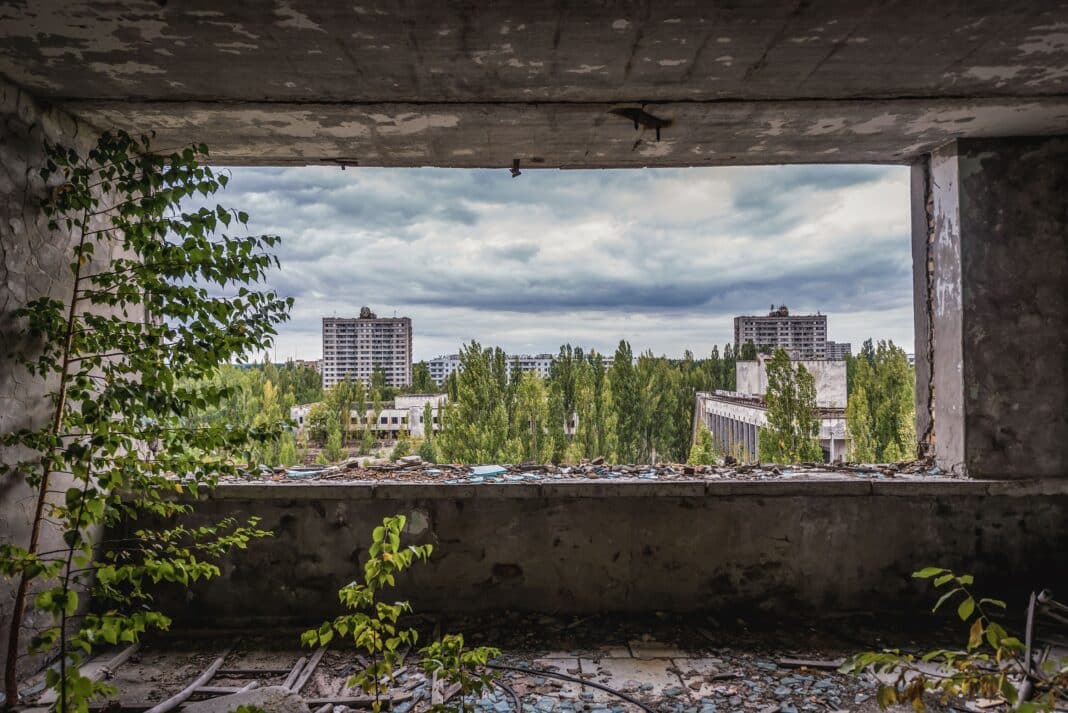 The exclusion zone is now the third-largest nature reserve in mainland Europe, an unexpected example of rewilding. In shot is the hotel in abandoned Pripyat city in Chernobyl Exclusion Zone, Ukraine. (Photo Credit: Fotokon via Shutterstock Images)