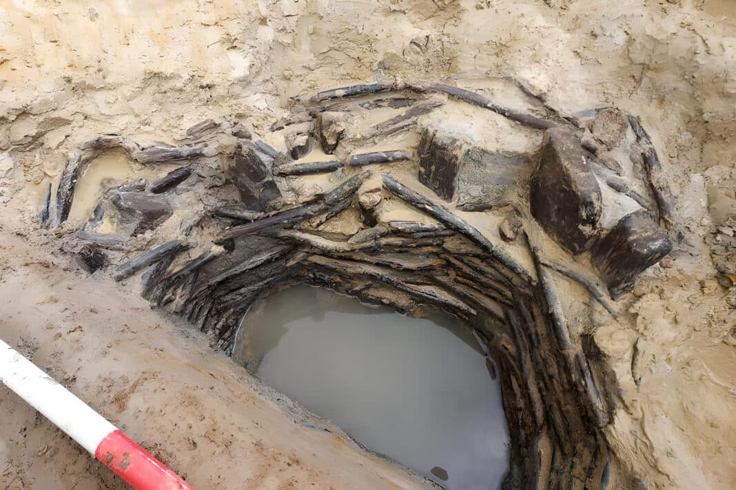 An image of the preserved wooden well found in Oxfordshire, England. The structure is thought to date to the late Bronze Age. (Photo Credit: Oxford Archaeology/Oxfordshire County Council)