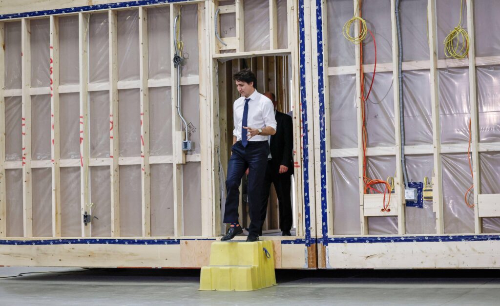 Canadian Prime Minister Justin Trudeau tours modular home construction facility before making a housing announcement in Calgary, Alta., Friday, April 5, 2024. Canada is turning to prefab, 3D printing, mass timber and panalisation to address it's surging housing crisis. (Photo Credit: The Canadian Press/Alamy Live News)