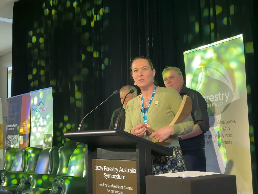 Simon Dorries, CEO of Responsible Wood and Dr Tony Bartlett, Chair of Responsible Wood, presented Monique Blason, ForestrySA's General Manager for Community Services with the 2024 Richard Stanton Memorial Award at the Forestry Australia symposium.