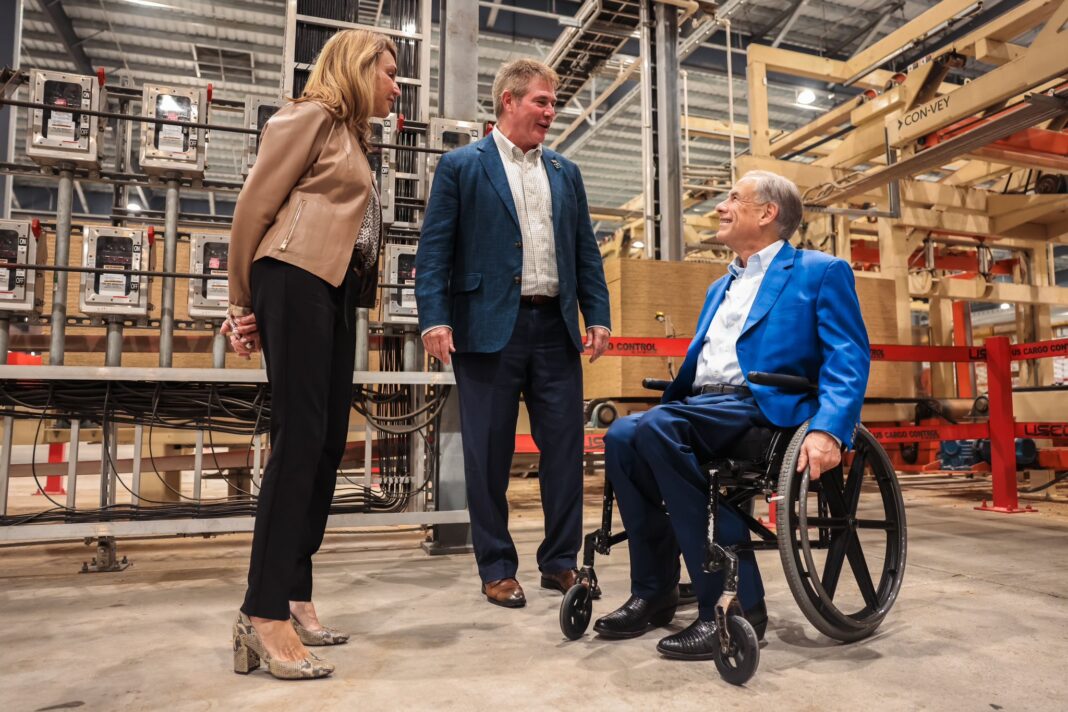 Texas Governor Greg Abbott with executives from Corrigan OSB yesterday. Texas is ramping up timber production to meet skyrocketing demand for housing. (Photo Credit: Gov Greg Abbott)